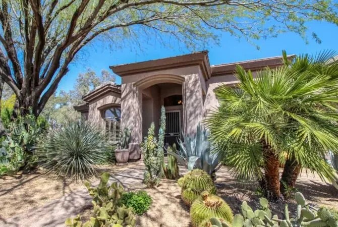 Exterior of an Alliance residential home with desert landscaping
